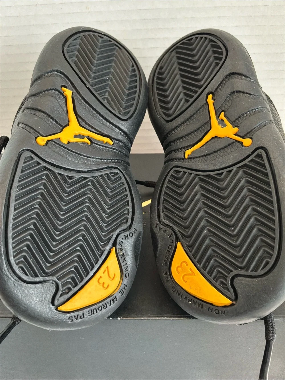 Jordan Kids Black Retro 12 Sneakers size 6c with gold sticker with box